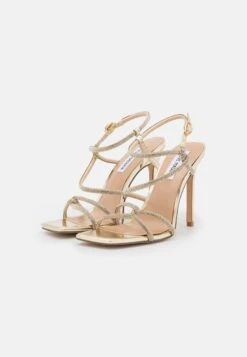 Steve Madden Implicit - Sandalen Met Hoge Hak - Gold -Fashionista Verkoop bf3ca453b0184f97aae795f92b034ca0 scaled